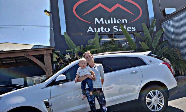 A brand new happy customer here with their new Cadillac SRX! Thanks for being our happy customer at Mullen Auto Sales Oceanside!