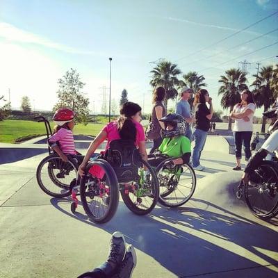 Lucy Ashley skates with friends at the Huber Skate Park