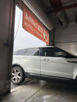 Smog check sign to locate the garage.