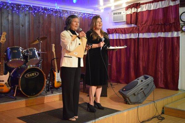 Director Teresa and co-host at our Holiday Concert