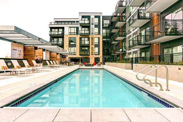 Outdoor pool with lounge seating