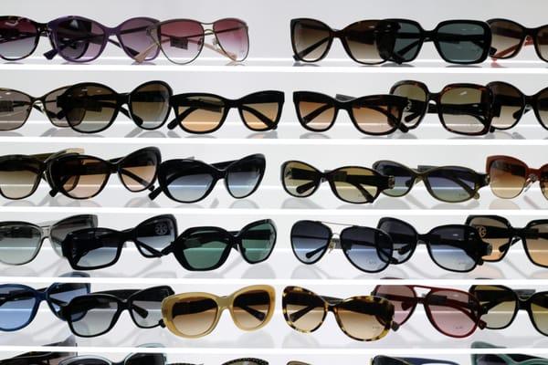 Some of the sunglasses in a display at Vision Care Specialists