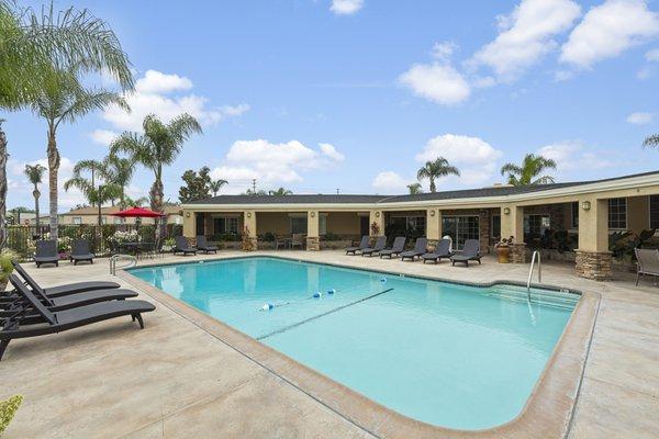 Our sparkling pool with lay out chairs makes for a perfect summer day in the sun!