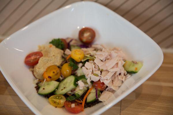 Power Bowl with ancient grains, mixed veggies, hummus & turkey