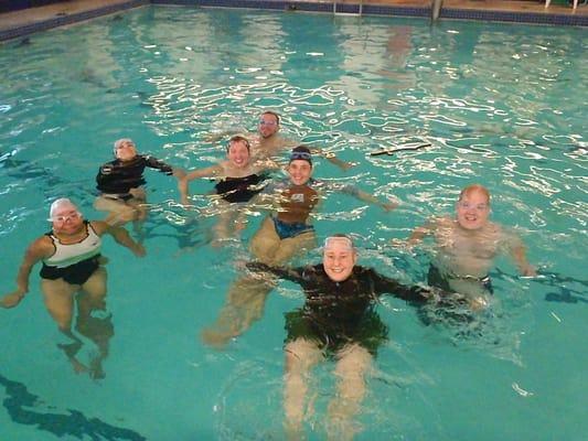 Next Step class smiling while haning out in deep water.  What a new wonderful experience.