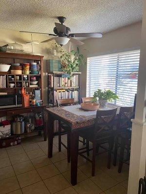 Dining room area ample space for china cabinet (excuse the mess)