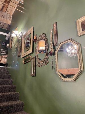 Wall of mirrors as you walk upstairs