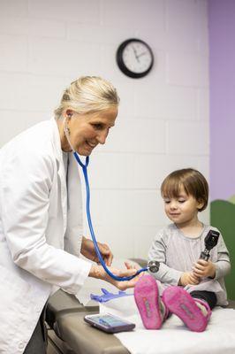 Dr. Chris introduces a patient to some tools of the trade.