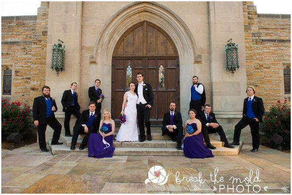 A Wedding party photographed in front of the front doors of Church Street United Methodist Church - by Break the Mold Photo