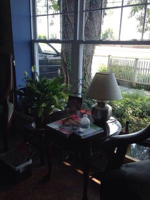 Waiting room overlooking Troy-Schenectady Rd in Latham. Water and reading materials. A little paperwork to fill out, but not bad