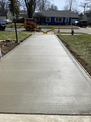 Concrete garage floor and driveway