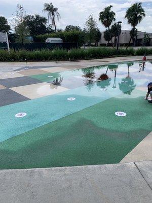 Splash pad but not a lot of drainage.