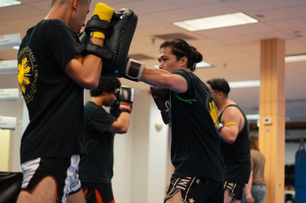 Unleash your warrior spirit at Impact. Experience authentic Muay Thai training with dedicated instructors.