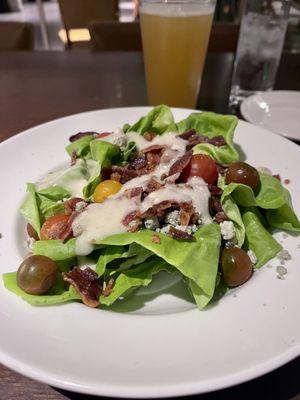 Bib lettuce salad with bleu cheese and bacon.