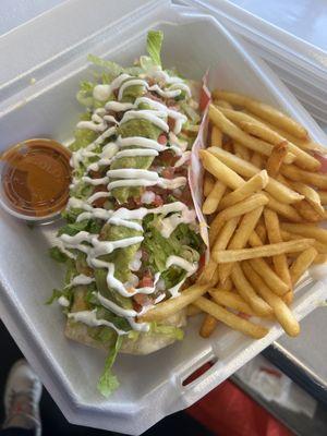 Carne Asada Supreme Burrito with fries on the side.