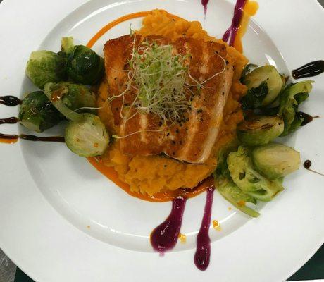 Fresh Altantic salmon served over sweet potato mash with sauteed brussel sprouts