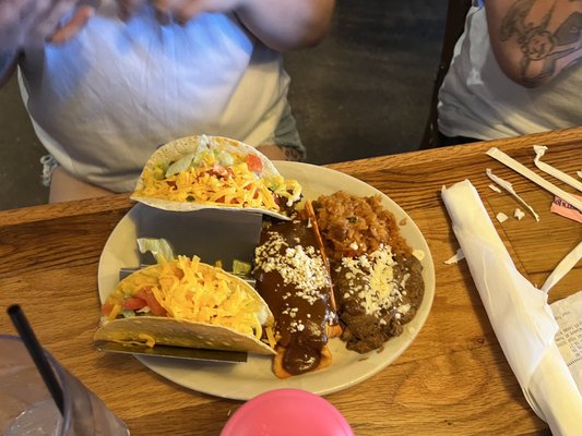 Combo with soft taco, hard taco and tamale