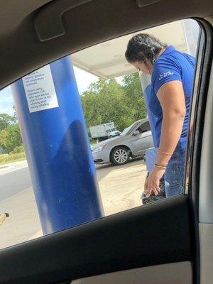 This Employee was smoking a cigar while I was pumping gas