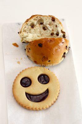 Smiley Face Linzer ($3) and inside of Chocoweggli ($2.50)