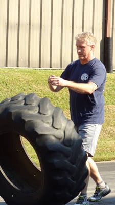 Annual workout for St. Jude tire flip