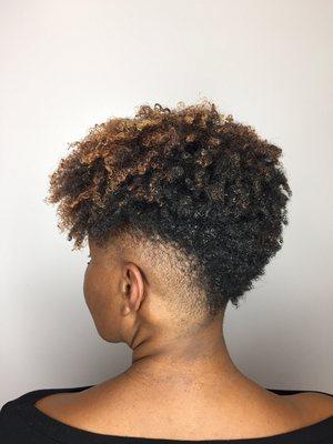 Tight curly Mohawk Cut