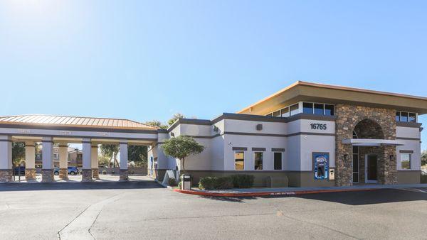 Outside Credit Union West Branch in Surprise, showing drive thru and exterior.