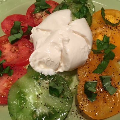 Burrata salad with heirloom tomatoes and basil from the market