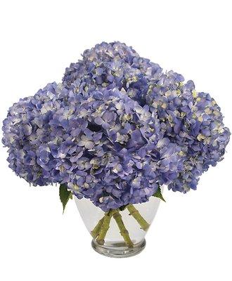 Beautiful vases filled with hydrangea. Available in many natural colors.