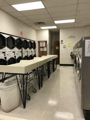 New floors add to the bright , clean atmosphere in our laundromat!