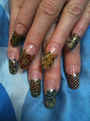 Beautifully hand sculptured, custom designed nails