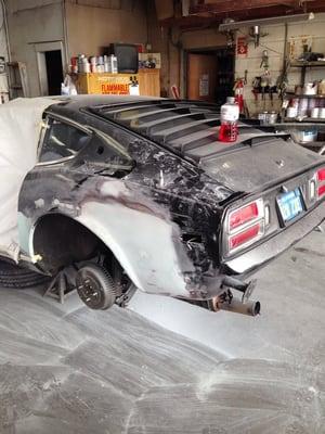 My 77 datsun quarter panel being fixed, the panel was already made of bondo when hit