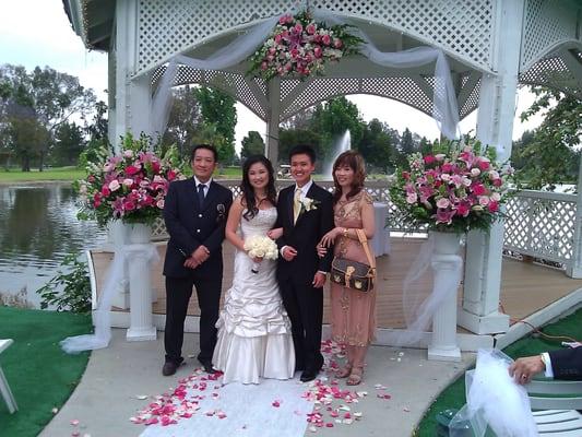 A lavish formal wedding by a lake.