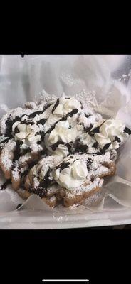 Funnel cake with chocolate syrup