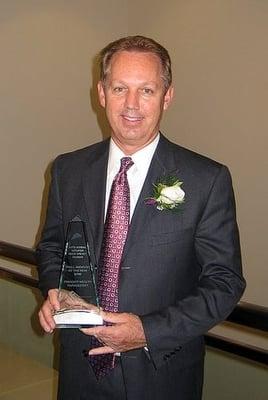 Dave Young, President of Paragon Wealth Management receiving the Small Business Award in 2008 from the Provo/Orem Chamber