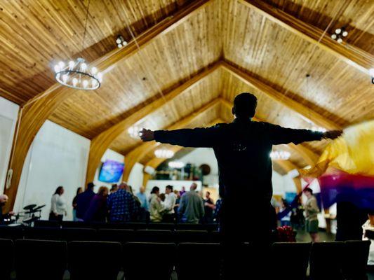 Inside the building at a worship service.