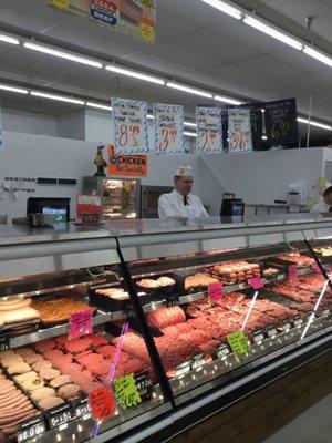 Top notch meat department with a large staff of butchers.