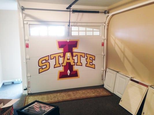 Iowa State Garage Door in The Door & Fence Store showroom.