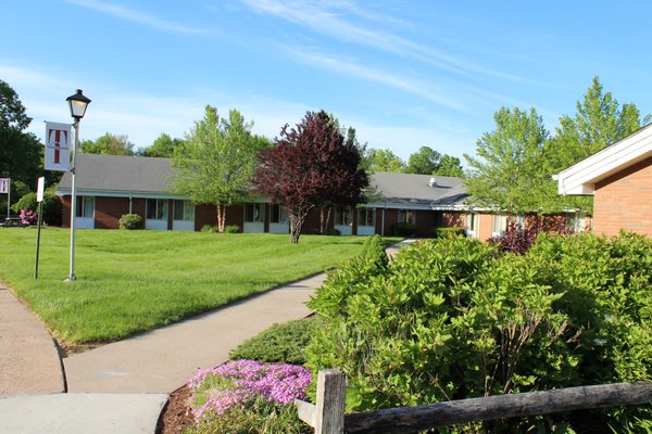 Quiet, suburban neighborhood setting with park like grounds.