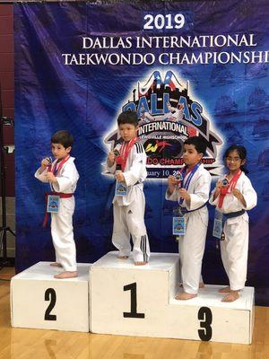 Students on a medal stand