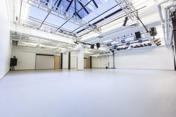 Studio C: A large white box studio theater featuring twin skylights, creating architecturally memorable space for classes and performances.