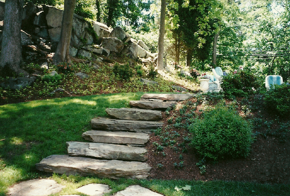 Fieldstone steps leading to a seating area