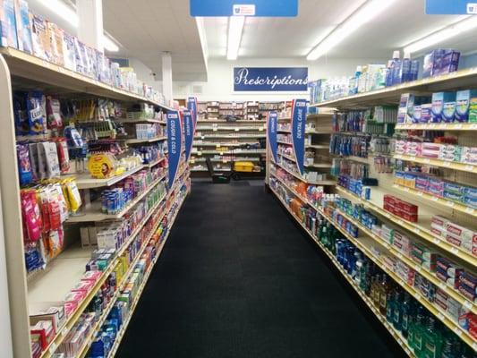 Looking down Aisle 2 towards the Pharmacy Counter