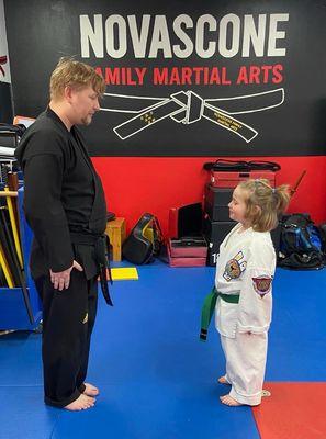 Showing respect after getting his second stripe.