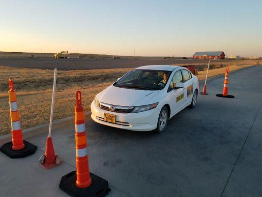 All students learn to parallel park using cones first and real cars when ready!