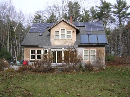 Net Zero = super insulated + passive + active solar design.