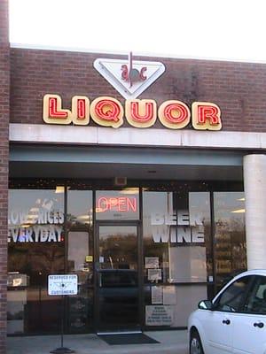 Look for the red neon "LIQUOR" sign.