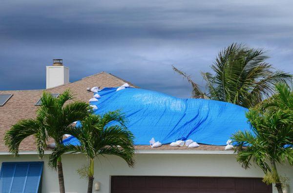 Storm damaged roof. Insurance Litigation Group will help you deal with your insurer.