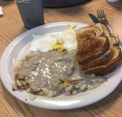 Sausage gravy over home fries