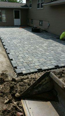 Brick paver patio installation