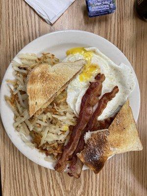 2 Eggs , Hash Browns , Choice of Meat and Toast